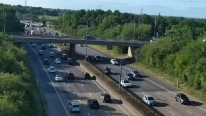 Drivers told to avoid stretch of M25 after  crash leaves two men fighting for their lives