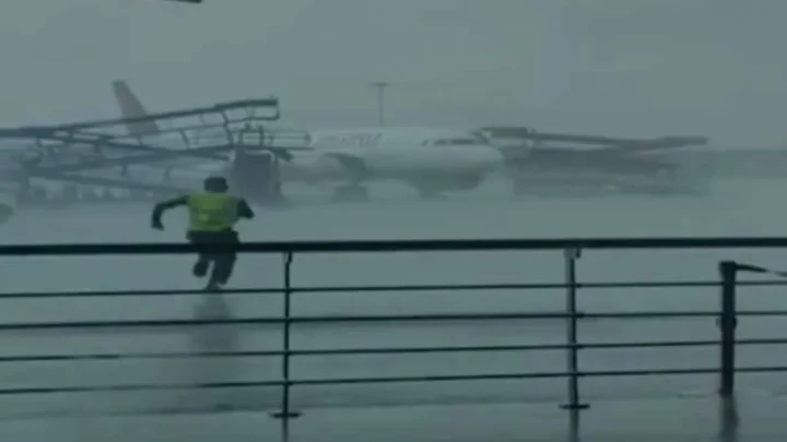Three planes damaged after storm sends unsecured gear crashing into aircraft