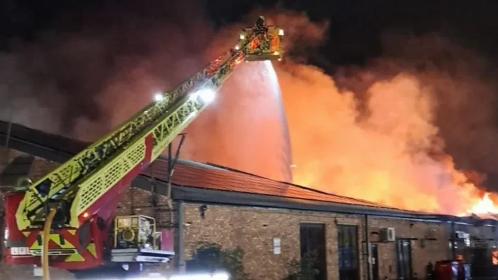 Dozens evacuated from homes in London after huge fire rips through warehouse