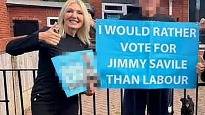 Reform councillor apologises after posing with poster endorsing Jimmy Savile