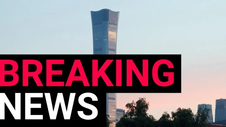 Plane crashes into Beijing’s tallest skyscraper the China Zun with wreckage plummeting to the ground