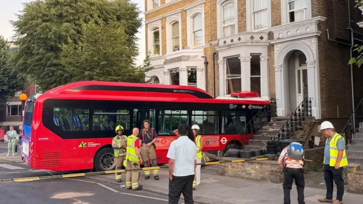 Bus smashes through window of Notting Hill house